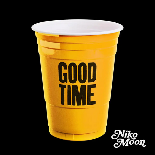 Yellow plastic cup with ’GOOD TIME’ printed on it in black letters.