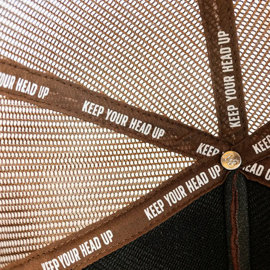 Brown mesh cap interior.