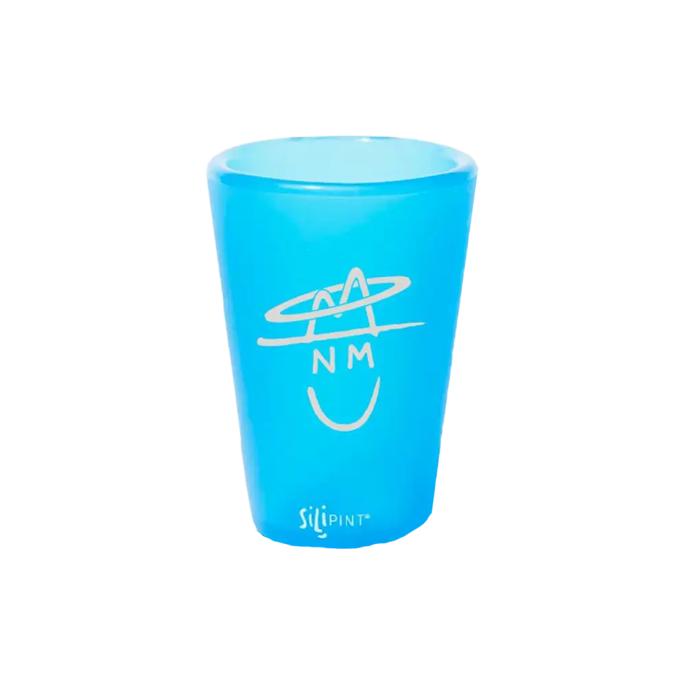 Blue plastic cup with a white smiley face design and ’NM’ text.