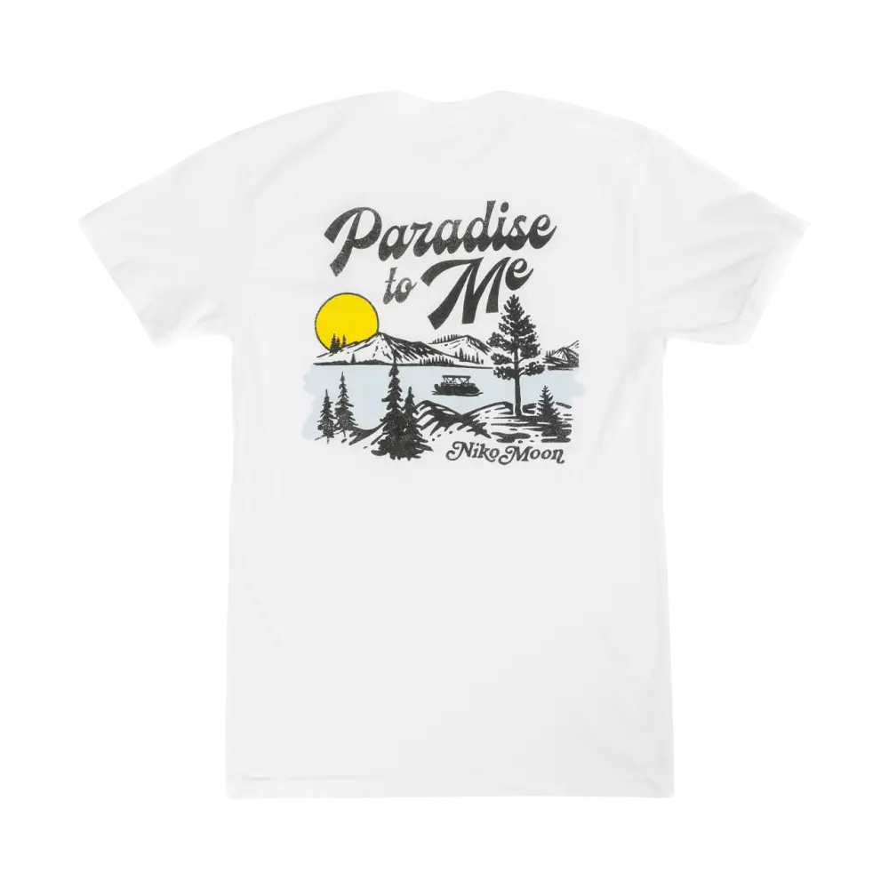 White t-shirt with a ’Paradise to Me’ graphic design featuring a lakeside scene.