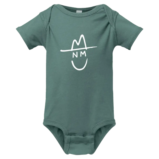 Teal-colored baby onesie featuring a white graphic of a smiling face wearing a hat with ’nm’ written below it.