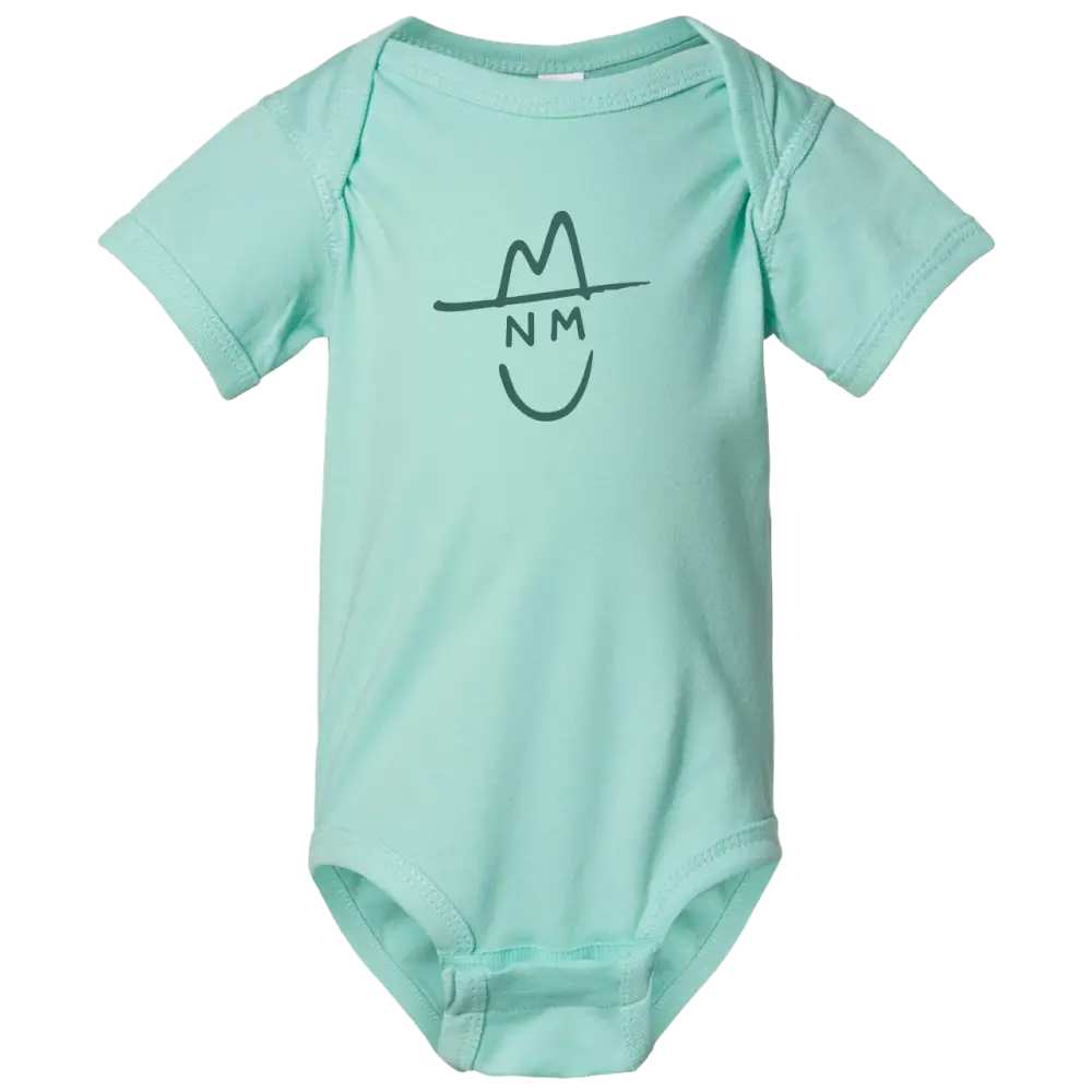 Mint green short-sleeved baby onesie with a black line drawing of a smiling face wearing a hat and the letters ’nm’ above it.