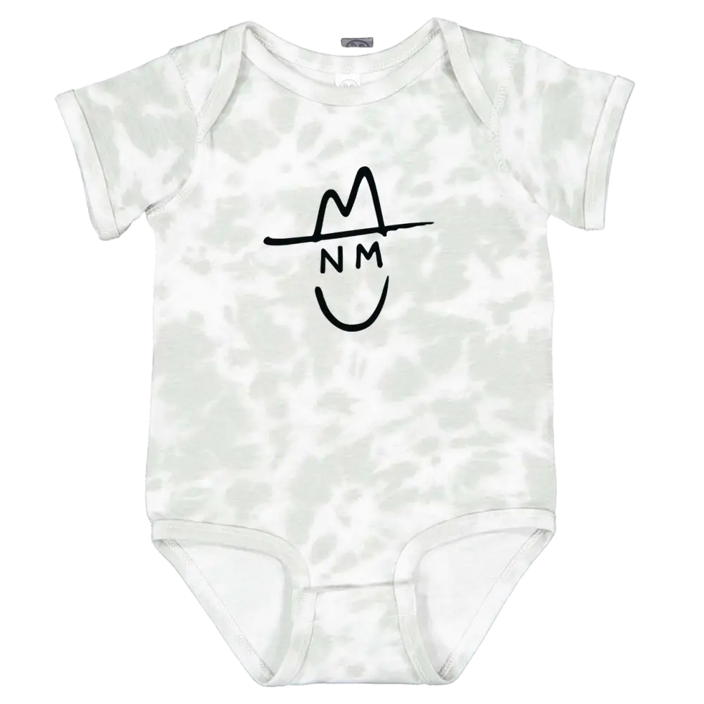 White tie-dye baby onesie with a black line drawing of a smiling face wearing a hat and the letters ’nm’ below it.