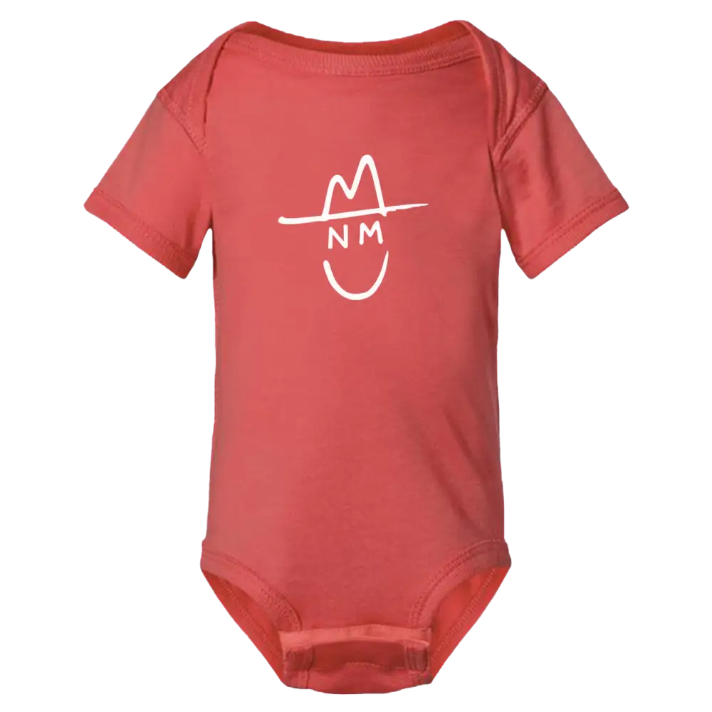 Coral-colored baby onesie with a white line-drawn hat and smiley face design.