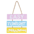 Hanging decorative sign with three colorful panels reading ’EASY TONIGHT NIKO MOON’ connected by rope.
