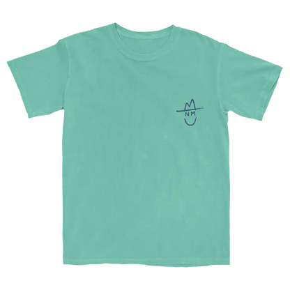 Mint green t-shirt with a small simple face design on the chest.