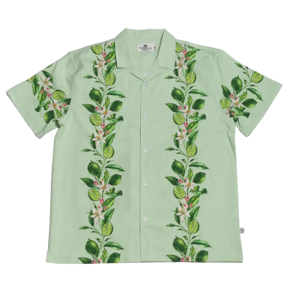 Light green short-sleeved hawaiian shirt with a vertical pattern of lime leaves and blossoms.