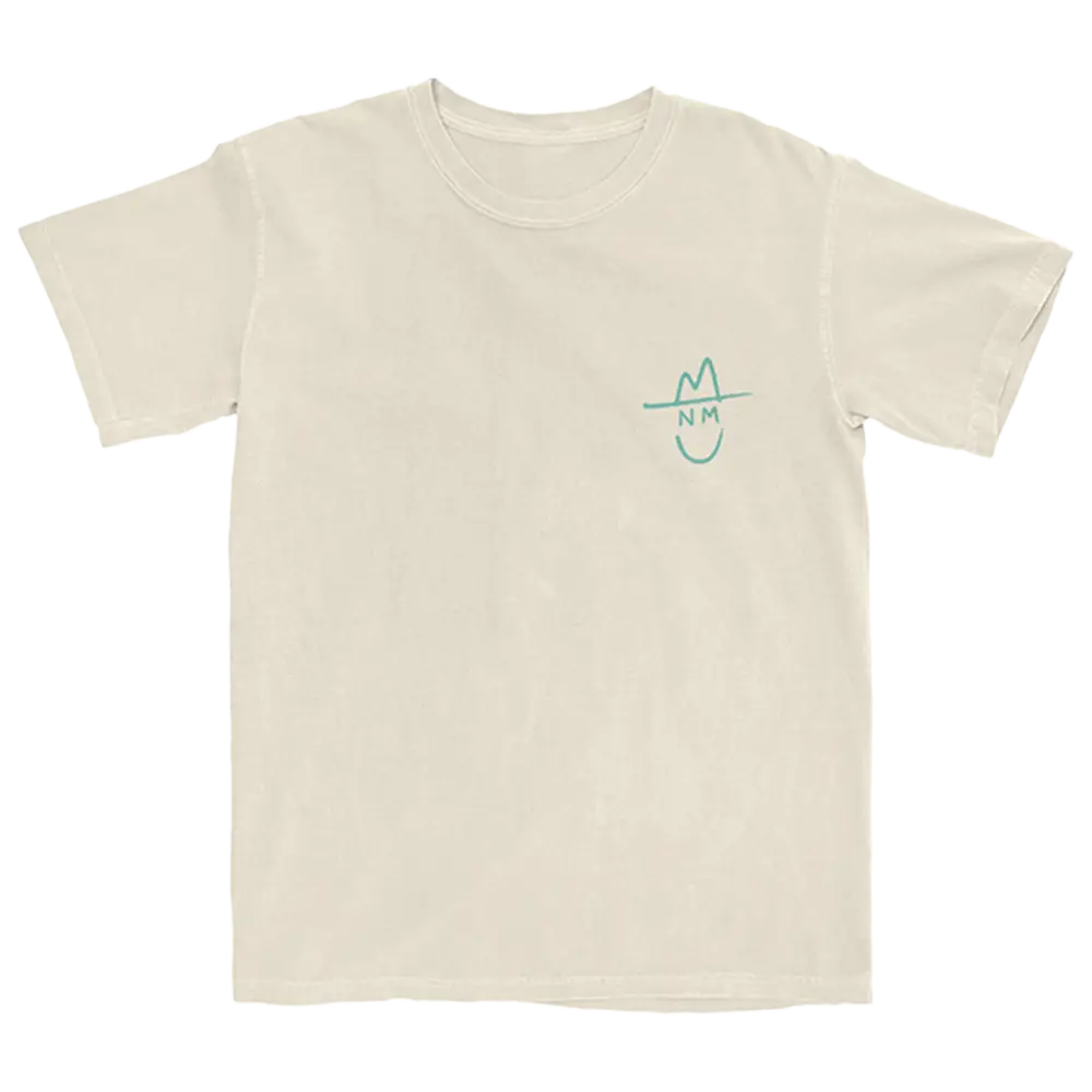 Beige t-shirt with a small teal smiley face design on the chest.